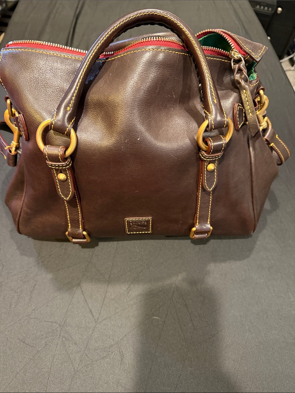 #671.  Dooney and Bourke florentine satchel.